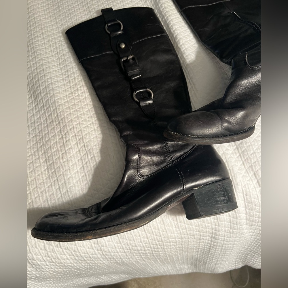 Tall black leather boots